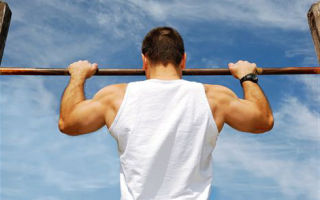 Hanging on the horizontal bar: benefits for the spine, which muscles work